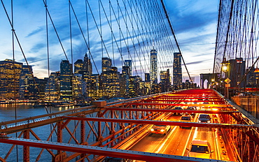 Manhattan skyline from the Brooklyn Bridge at night, New York, United States of America, North America