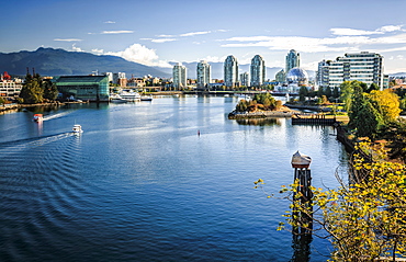 View of False Creek and Vancouver skyline, including World of Science Dome, Vancouver, British Columbia, Canada, North America