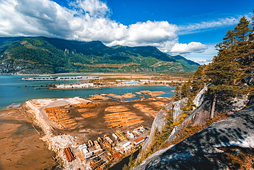 Elevated view of lumber yard in How Sound near Fury Creek near Squamish, British Columbia, Canada, North America