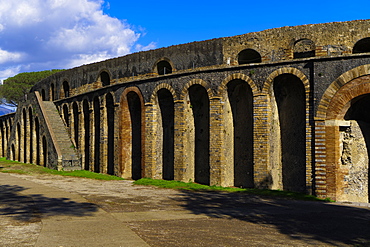 Side entrance to the ruins of the stone built Roman Anfiteatro di Pompeii (Amphitheatre), capacity 20000 people, Pompeii, UNESCO World Heritage Site, Campania, Italy, Europe