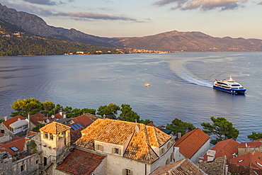 View from the bell tower of the cathedral inside the old town of Korcula over the bay, Korcula, Croatia, Europe