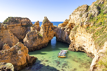 Boats anchoring at Ponta da Piedade, Lagos, Algarve, Portugal, Europe