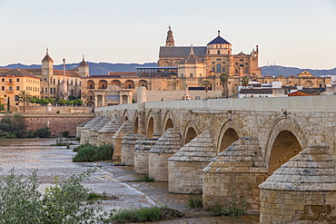 The Mosque-Cathedral (Great Mosque of Cordoba) (Mezquita) and the Roman Bridge at first light, UNESCO World Heritage Site, Cordoba, Andalusia, Spain, Europe