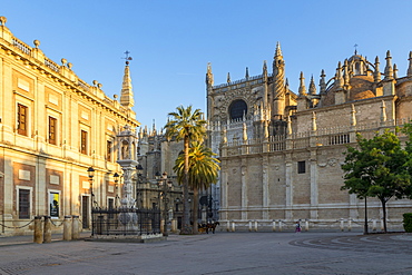 Cathedral of Seville and Archivo de Indias, UNESCO World Heritage Site, seen from Plaza del Triunfo at first sunlight, Seville, Andalusia, Spain, Europe