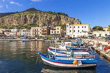 Colourful boats anchoring at the port of Mondello with view to Mount Gallo in the background, Palermo, Sicily, Italy, Europe