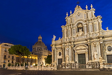 The illuminated cathedral and Saint Agatha Abbey during blue hour, Catania, Sicily, Italy, Europe