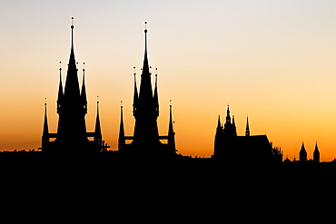 Silhouettes of Our Lady before Tyn Church and St. Vitus Cathedral at sunset, UNESCO World Heritage Site,Prague, Bohemia, Czech Republic, Europe