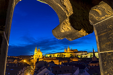 View from the Lesser Town Bridge Tower to Prague Castle and St. Nicholas Church at dusk, UNESCO World Heritage Site, Prague, Bohemia, Czech Republic, Europe