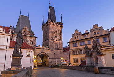 The Lesser Town Bridge Tower seen from Charles Bridge at dawn, UNESCO World Heritage Site, Prague, Bohemia, Czech Republic, Europe