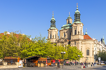 St. Nicholas church seen from the old town market hall, Prague, Bohemia, Czech Republic, Europe