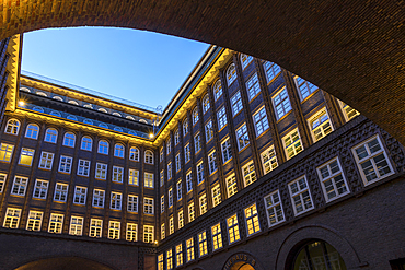 Illuminated Chilehaus, part of the Kontorhaus District, at dusk, UNESCO World Heritage Site, Hamburg, Germany, Europe