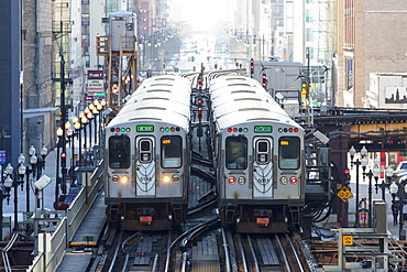 Two Chicago CTA L trains near Adams and Wabash station in The Loop, Chicago, Illinois, United States of America, North America