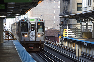 Green Line Chicago CTA L train to Harlem heading North at Adams and Wabash station, Chicago, Illinois, United States of America, North America