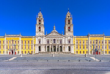 Main façade of the Royal Building of Mafra, designed by architect João Frederico Ludovice, Palace of Mafra, Mafra, Portugal