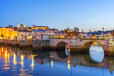 View on Gilão river, the roman bridge, Tavira, Algarve, Portugal