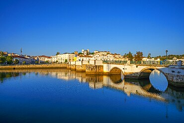 View on Gilão river, the roman bridge, Tavira, Algarve, Portugal