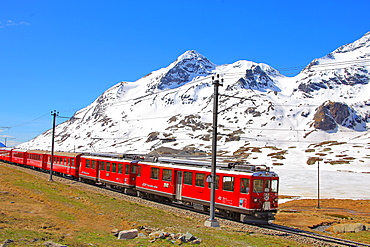 The Bernina express near the Black Lake, Canton of Graubunden (Grigioni), Switzerland, Europe