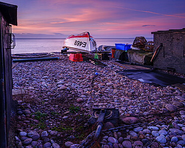 Turning block and boat on the pebbled beach at Budleigh Salterton, Devon, England, United Kingdom, Europe