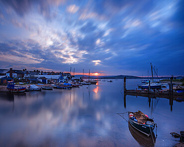 Sunset with boats on the Exe shoreline at the back of Camperdown Terrace, Exmouth, Devon, England, United Kingdom, Europe