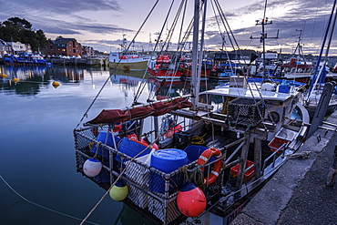 Boats in the harbour of the popular fishing port of Padstow, Cornwall, England, United Kingdom, Europe