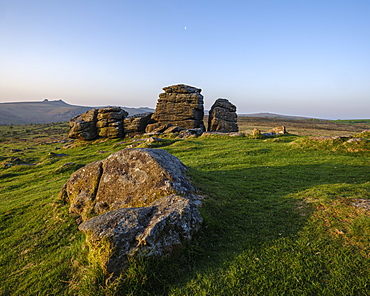 Warm sunlight on granite at Hound Tor in Dartmoor National Park, Bovey Tracey, Devon, England, United Kingdom, Europe