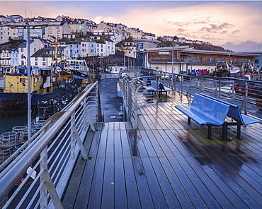 Wet teak decking and benches of the elevated nautical viewpoint for the harbour of Brixham, Devon, England, United Kingdom, Europe