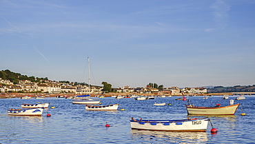 Boats at sunrise looking across Teign estuary to Shaldon at The Point, Teignmouth, Devon, England, United Kingdom, Europe