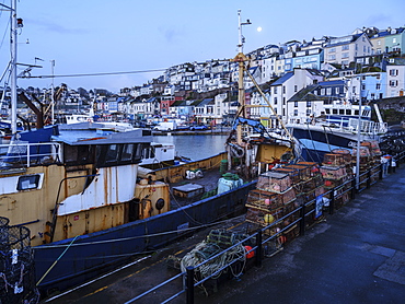 The colourful houses on the hillside above the harbour of Brixham, Devon, England, United Kingdom, Europe