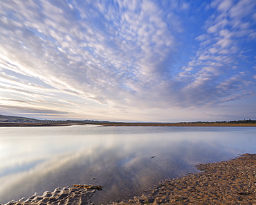 Looking North up the Exe estuary with interesting clouds and reflections from Exmouth, Devon, England, United Kingdom, Europe