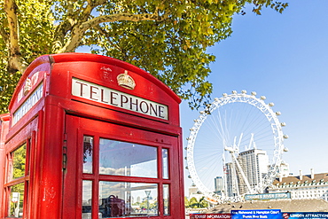 The London Eye and red telephone kiosk, London, England, United Kingdom, Europe