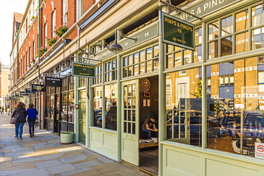 A beautiful street and stores around the Old Spitalfields Market, London, England, United Kingdom, Europe