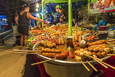 Grilled meats for sale at a food stall at Kamala night market in Phuket, Thailand, Southeast Asia, Asia