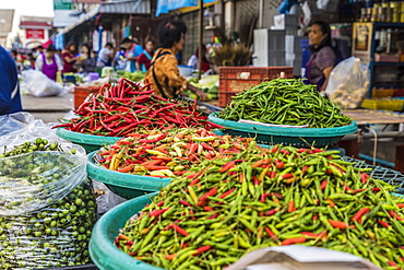 A stall selling chillis at the 24 hour local fresh food market in Phuket Town, Phuket, Thailand, Southeast Asia, Asia