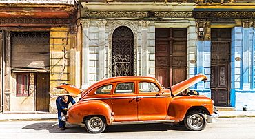 A typical street scene in Centro in Havana, Cuba, West Indies, Caribbean, Central America