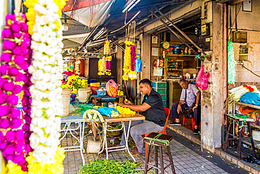 Colourful traditional garland maker in George Town, UNESCO World Heritage Site, Penang Island, Malaysia, Southeast Asia, Asia