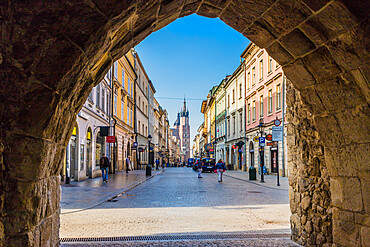 A street scene in the medieval old town, UNESCO World Heritage Site, Krakow, Poland, Europe