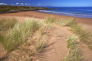 The remote sandy beach at Red Point with the Isle of Skye on the horizon, Wester Ross, Scotland, United Kingdom, Europe