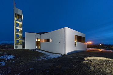 Illuminated modern church at Egilsstadir at night, East Fjords area, Iceland, Polar Regions