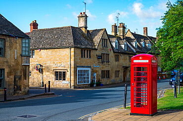 Red telephone box on High Street, Chipping Campden, Cotswolds, Gloucestershire, England, United Kingdom, Europe