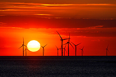 Offshore wind farm with amazing sunset, New Brighton, Cheshire, England, United Kingdom, Europe