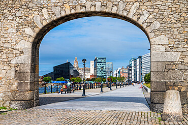 Footpath in front of the The Royal Albert Dock leading to the Three Graces, Liverpool, Merseyside, England, United Kingdom, Europe