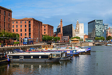 Canal barges moored at The Royal Albert Dock, Liverpool, Merseyside, England, United Kingdom, Europe