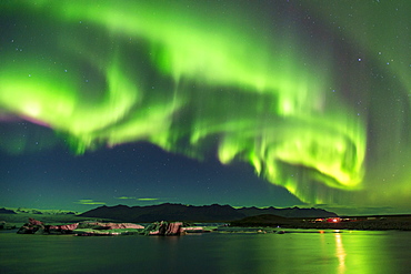 Amazing Aurora Borealis (Northern Lights) display over Jokulsarlon Glacial Lagoon, South Iceland, Iceland, Polar Regions