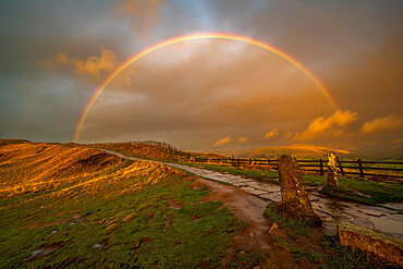 Rainbow over the path leading towards Mam Tor, Peak District, Derbyshire