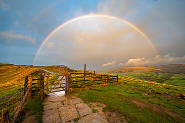 Rainbow with gate and path leading towards Mam Tor, Peak District, Derbyshire