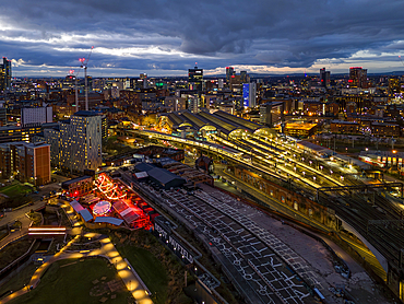 Ariel view of Manchester Piccadilly station and city at night, Manchester.