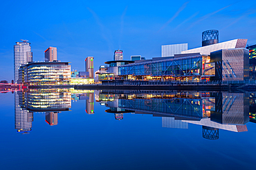 Salford Quays and The Lowry Theatre reflected with mirror conditions, Salford, Manchester