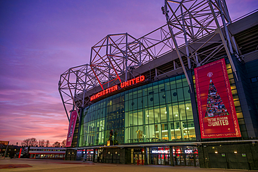 MUFC football ground with Christmas Banner. Old Trafford, Trafford, Manchester