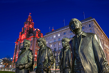 The Beatles statue at night, Liverpool waterfront, Liverpool, Merseyside, England, United Kingdom,
