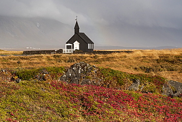 Budir Black church in autumn backed by the Snaefellsnes mountains, Budir, Snaefellsnes Peninsula, Iceland, Polar Regions